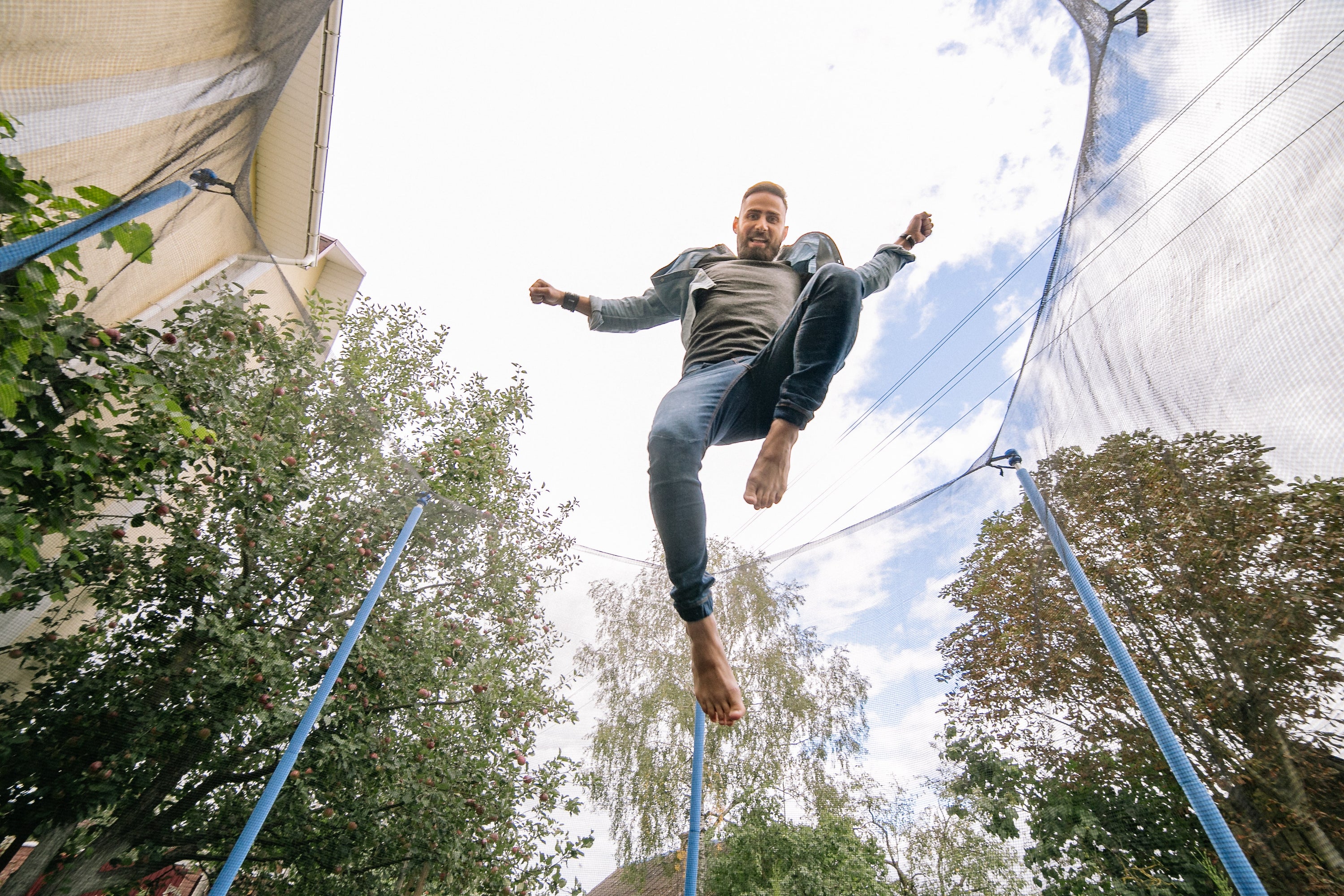 Creative and fun ways to use a trampoline, such as trampoline yoga, games, and acrobatics